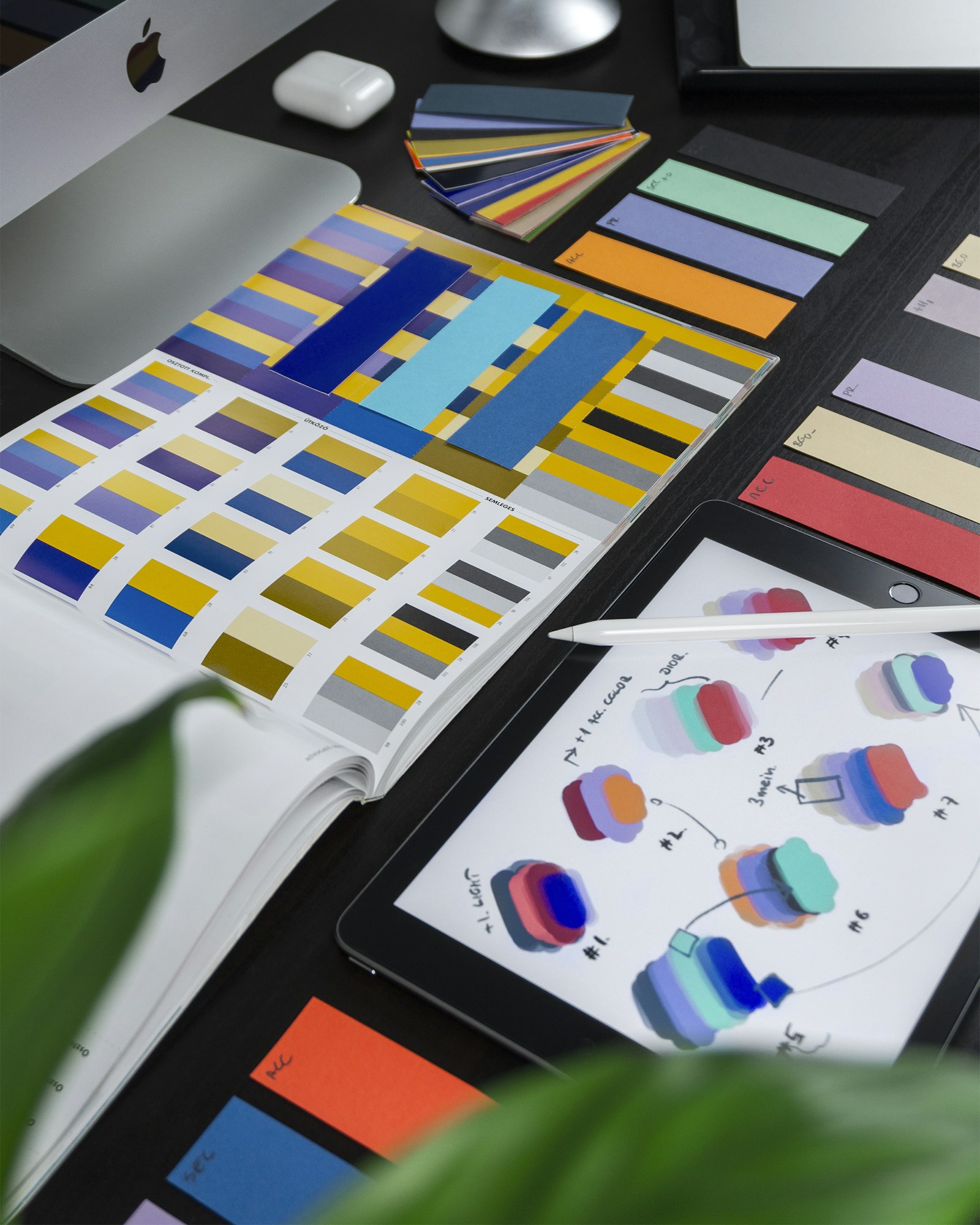 UI design craft — sketches and interface layouts on a desk